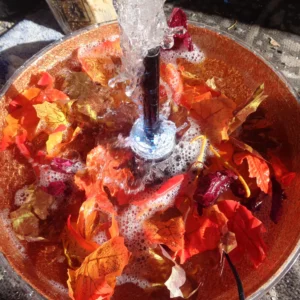 outdoor fall fountain with copper bowl and night lights, seasonal decor
